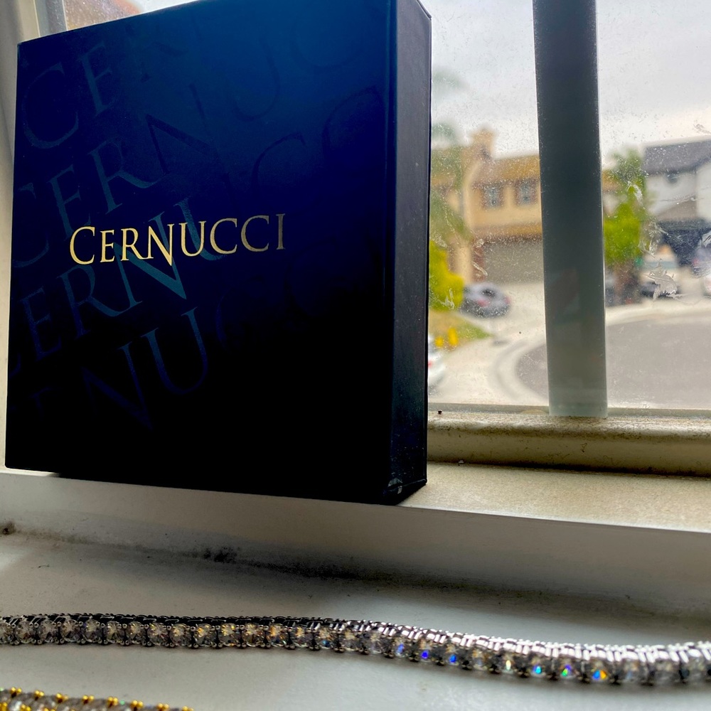 Cernucci white and yellow gold 18’ chain.